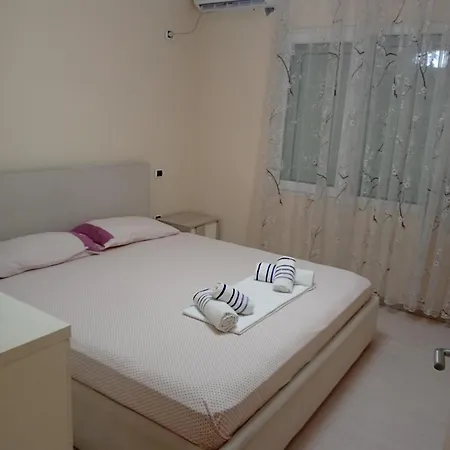 New 9 * Tirana